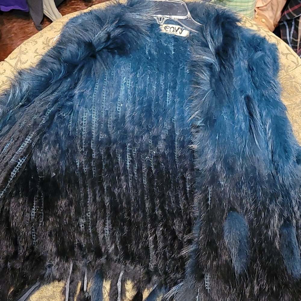 Feather vest make an offer